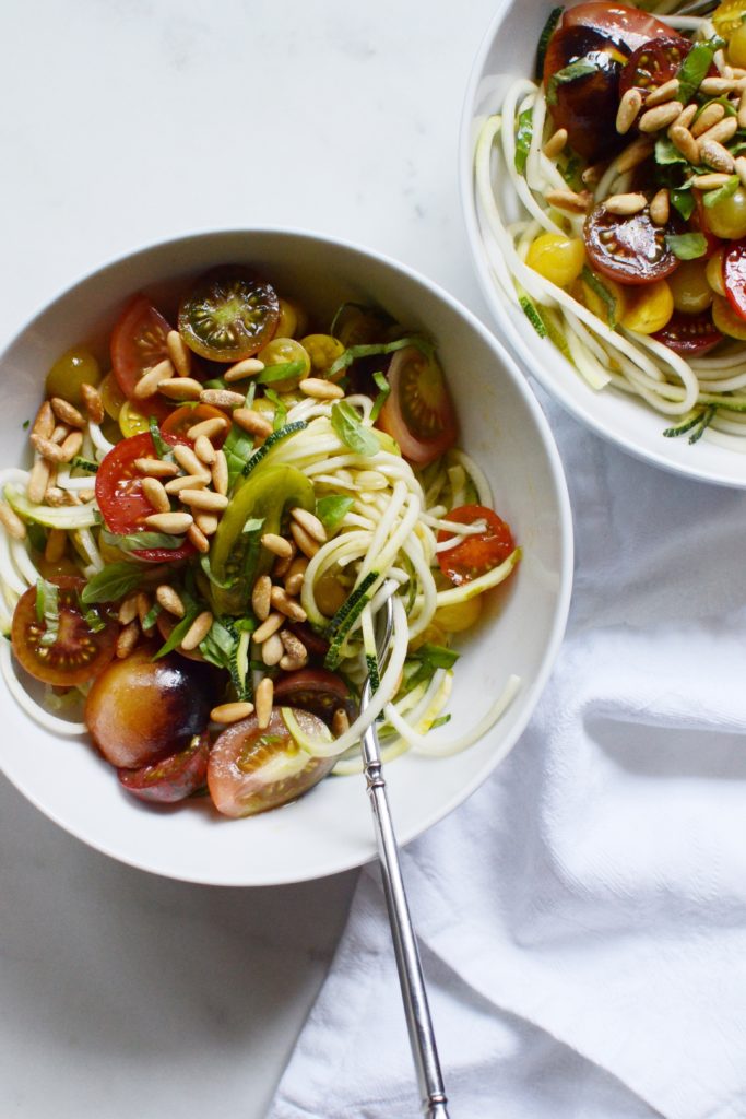 raw zucchini noodles with balsamic marinated tomatoes